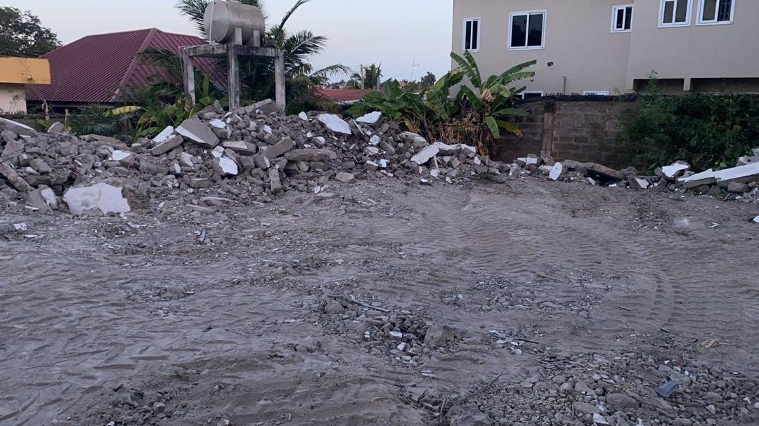 Cleared site with rubble piles